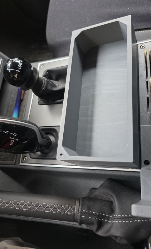 Storage above buttons